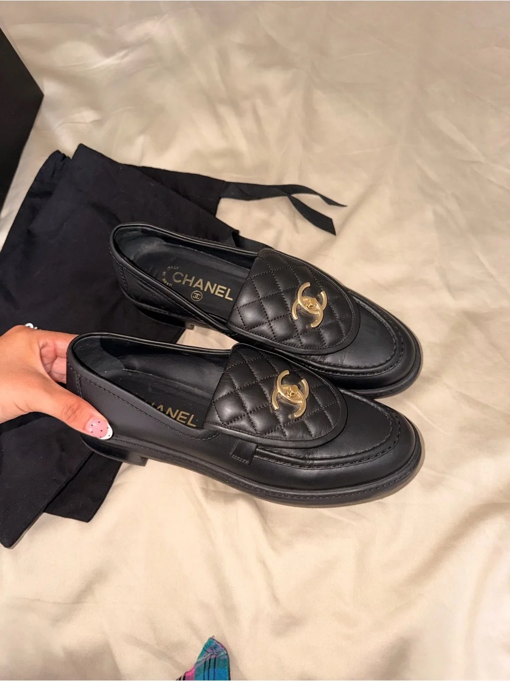 Chanel’s Black Quilted Leather Loafers with Gold CC Hardware